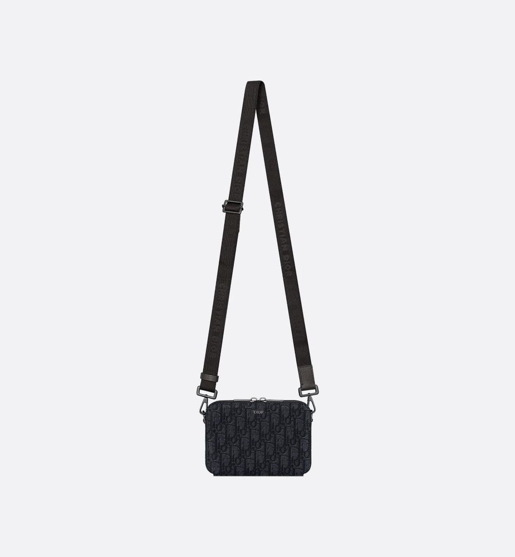 Pochette zippée à bandoulière
Toile jacquard Dior Oblique noir